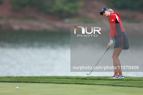 GAINESVILLE, VIRGINIA - SEPTEMBER 13: Nelly Korda of the United States chips to the 9th green during Day One of the Solheim Cup at Robert Tr...