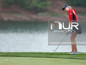 GAINESVILLE, VIRGINIA - SEPTEMBER 13: Nelly Korda of the United States chips to the 9th green during Day One of the Solheim Cup at Robert Tr...