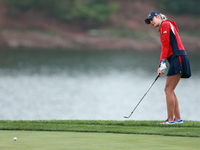 GAINESVILLE, VIRGINIA - SEPTEMBER 13: Nelly Korda of the United States chips to the 9th green during Day One of the Solheim Cup at Robert Tr...