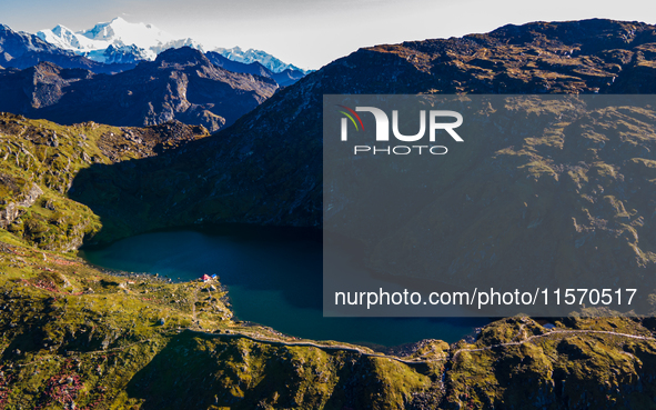 A drone captures an aerial view of Timbung Mountain Lake in Taplejung, Nepal, on September 10, 2024. 