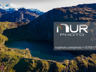 A drone captures an aerial view of Timbung Mountain Lake in Taplejung, Nepal, on September 10, 2024. (