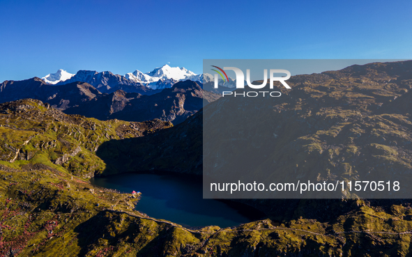 A drone captures an aerial view of Timbung Mountain Lake in Taplejung, Nepal, on September 10, 2024. 