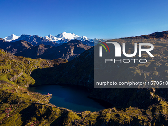 A drone captures an aerial view of Timbung Mountain Lake in Taplejung, Nepal, on September 10, 2024. (