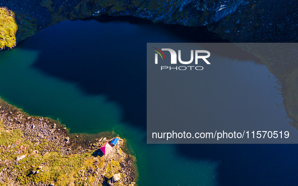 A drone captures an aerial view of Timbung Mountain Lake in Taplejung, Nepal, on September 10, 2024. 