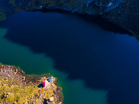 A drone captures an aerial view of Timbung Mountain Lake in Taplejung, Nepal, on September 10, 2024. (