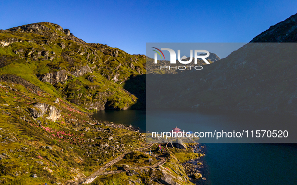 A drone captures an aerial view of Timbung Mountain Lake in Taplejung, Nepal, on September 10, 2024. 