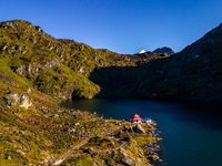 A drone captures an aerial view of Timbung Mountain Lake in Taplejung, Nepal, on September 10, 2024. (