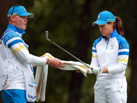 GAINESVILLE, VIRGINIA - SEPTEMBER 13: Albane Valenzuela of Team Europe takes a towel from her caddie at the 9th tee during Day One of the So...