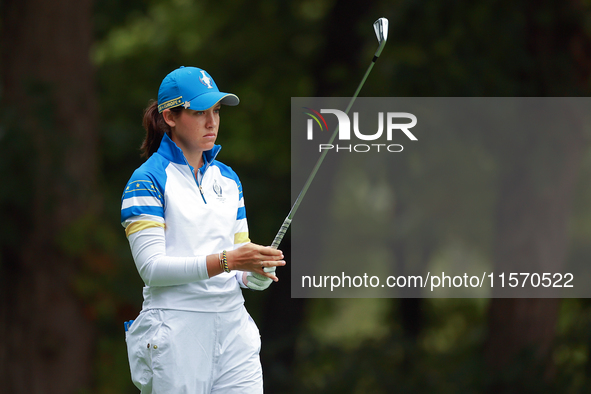 GAINESVILLE, VIRGINIA - SEPTEMBER 13: Albane Valenzuela of Team Europe lines up her shot at the 9th tee during Day One of the Solheim Cup at...