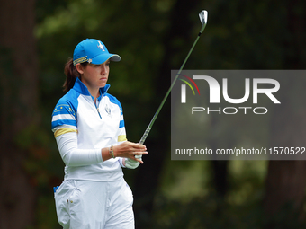 GAINESVILLE, VIRGINIA - SEPTEMBER 13: Albane Valenzuela of Team Europe lines up her shot at the 9th tee during Day One of the Solheim Cup at...