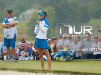 GAINESVILLE, VIRGINIA - SEPTEMBER 13: Esther Henseleit of Team Europe reacts to her putt on the 16th grenn during Foursome Matches on Day On...