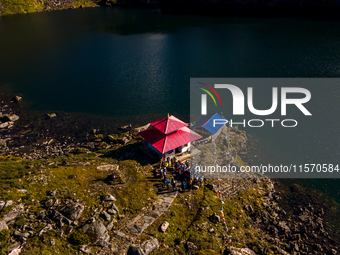 A drone captures an aerial view of the first Timbung Pokhari Trail Run competition in Taplejung, Nepal, on September 11, 2024. (