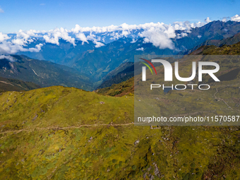 A drone captures an aerial view of the first Timbung Pokhari Trail Run competition in Taplejung, Nepal, on September 11, 2024. (