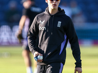 Jacob Bethell of England warms up during the Second Vitality T20 International match between England and Australia at Sofia Gardens in Cardi...