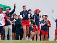 GAINESVILLE, VIRGINIA - SEPTEMBER 13: Nelly Korda of the United States cheers on Team USA next to Captain Stacy Lewis of the United States a...