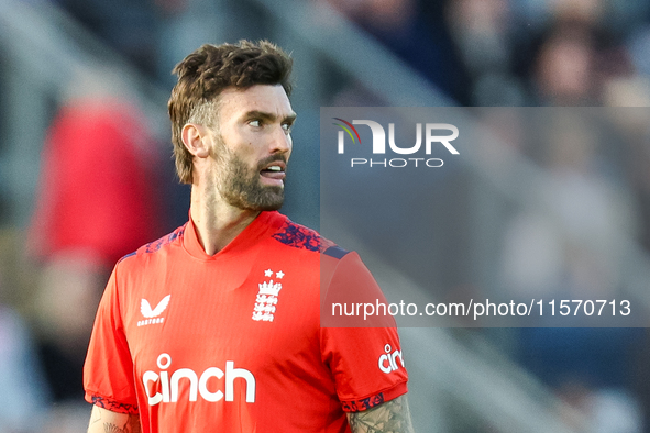 Reece Topley of England stands between deliveries in the opening over during the Second Vitality T20 International match between England and...