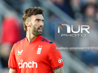 Reece Topley of England stands between deliveries in the opening over during the Second Vitality T20 International match between England and...