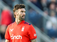 Reece Topley of England stands between deliveries in the opening over during the Second Vitality T20 International match between England and...