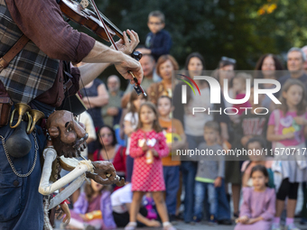 Street performance by the artists from Bologna, Italy, GRANDE CANTAGIRO BARATTOLI, in the center of Sofia, Bulgaria, on September 13, 2024,...