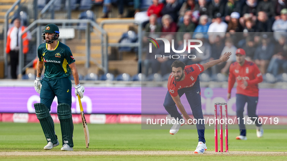 #25, Saqib Mahmoud of England bowls during the Second Vitality T20 International match between England and Australia at Sofia Gardens in Car...