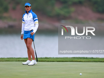 GAINESVILLE, VIRGINIA - SEPTEMBER 13: Celine Boutier of Team Europe follows her putt on the 9th green during Day One of the Solheim Cup at R...