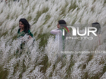 People Visit A Kans Grass Flower Field On The Afternoon Of The Weekend, At The Sarighat Area In Dhaka, Bangladesh, On Friday, September 13,...