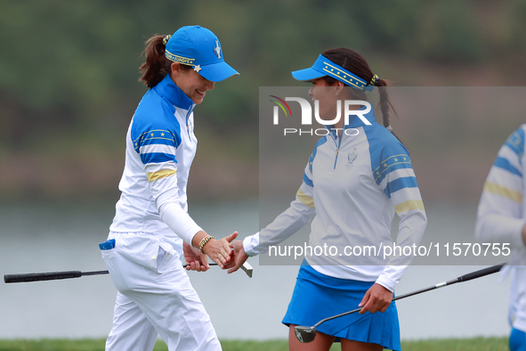 GAINESVILLE, VIRGINIA - SEPTEMBER 13: Celine Boutier of Team Europe celebrates with Albane Valenzuela of Team Europe on the 9th green  durin...