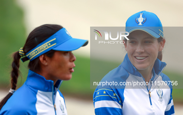 GAINESVILLE, VIRGINIA - SEPTEMBER 13: Celine Boutier (L) of Team Europe walks with Albane Valenzuela (R)  of Team Europe  on the 9th green d...