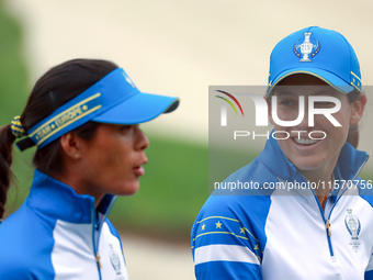 GAINESVILLE, VIRGINIA - SEPTEMBER 13: Celine Boutier (L) of Team Europe walks with Albane Valenzuela (R)  of Team Europe  on the 9th green d...