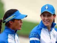 GAINESVILLE, VIRGINIA - SEPTEMBER 13: Celine Boutier (L) of Team Europe walks with Albane Valenzuela (R)  of Team Europe  on the 9th green d...