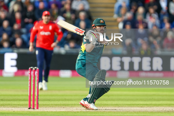 Travis Head of Australia hits the ball to the boundary for 4 during the Second Vitality T20 International match between England and Australi...