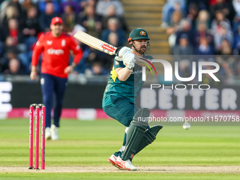 Travis Head of Australia hits the ball to the boundary for 4 during the Second Vitality T20 International match between England and Australi...