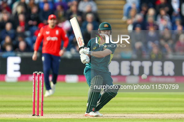 Travis Head of Australia hits the ball to the boundary for 4 during the Second Vitality T20 International match between England and Australi...