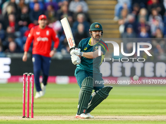 Travis Head of Australia hits the ball to the boundary for 4 during the Second Vitality T20 International match between England and Australi...