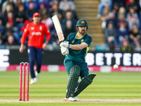 Travis Head of Australia hits the ball to the boundary for 4 during the Second Vitality T20 International match between England and Australi...