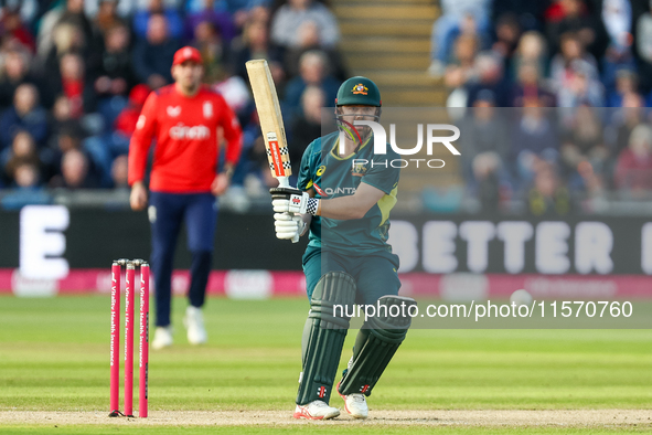 Travis Head of Australia hits the ball to the boundary for 4 during the Second Vitality T20 International match between England and Australi...