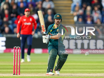 Travis Head of Australia hits the ball to the boundary for 4 during the Second Vitality T20 International match between England and Australi...