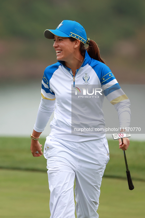 GAINESVILLE, VIRGINIA - SEPTEMBER 13: Albane Valenzuela of Team Europe walks off of the 9th green during Day One of the Solheim Cup at Rober...