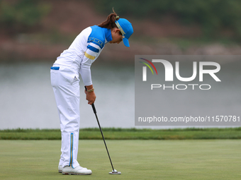 GAINESVILLE, VIRGINIA - SEPTEMBER 13:  Albane Valenzuela of Team Europe putts on the 9th green during Day One of the Solheim Cup at Robert T...