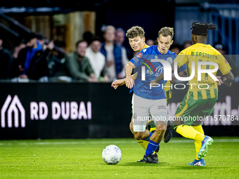 FC Den Bosch player Rik Mulders and ADO Den Haag player Joel Ideho during the match between Den Bosch and ADO at De Vliert for the Keuken Ka...