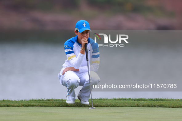 GAINESVILLE, VIRGINIA - SEPTEMBER 13: Albane Valenzuela of Team Europe lines up her putt on the 9th green during Day One of the Solheim Cup...