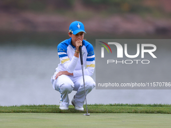 GAINESVILLE, VIRGINIA - SEPTEMBER 13: Albane Valenzuela of Team Europe lines up her putt on the 9th green during Day One of the Solheim Cup...