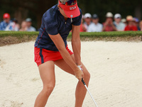 GAINESVILLE, VIRGINIA - SEPTEMBER 13: Lexi Thompson of the United States hits out of the third sand trap of three different traps she hit fr...