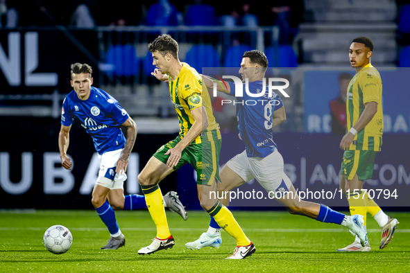 ADO Den Haag player Jari Vlak and FC Den Bosch player Torles Knoll during the match between Den Bosch and ADO at De Vliert for the Keuken Ka...