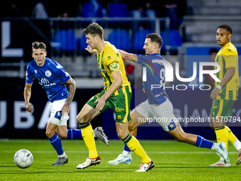 ADO Den Haag player Jari Vlak and FC Den Bosch player Torles Knoll during the match between Den Bosch and ADO at De Vliert for the Keuken Ka...