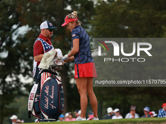 GAINESVILLE, VIRGINIA - SEPTEMBER 13: Lexi Thompson of the United States hits out of the third sand trap of three different traps she hit fr...