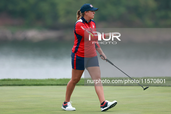 GAINESVILLE, VIRGINIA - SEPTEMBER 13: Lauren Coughlin of the United States walks on the 9th green during Day One of the Solheim Cup at Rober...