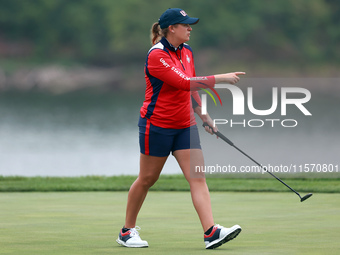 GAINESVILLE, VIRGINIA - SEPTEMBER 13: Lauren Coughlin of the United States walks on the 9th green during Day One of the Solheim Cup at Rober...