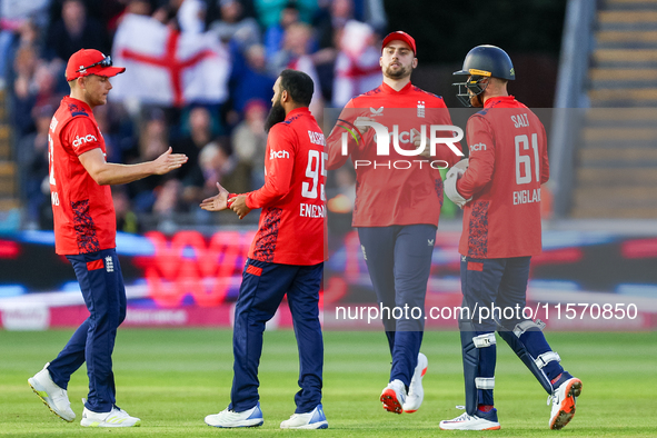 Adil Rashid of England is congratulated for his dismissal of Matthew Short of Australia during the Second Vitality T20 International match b...