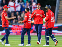 Adil Rashid of England is congratulated for his dismissal of Matthew Short of Australia during the Second Vitality T20 International match b...